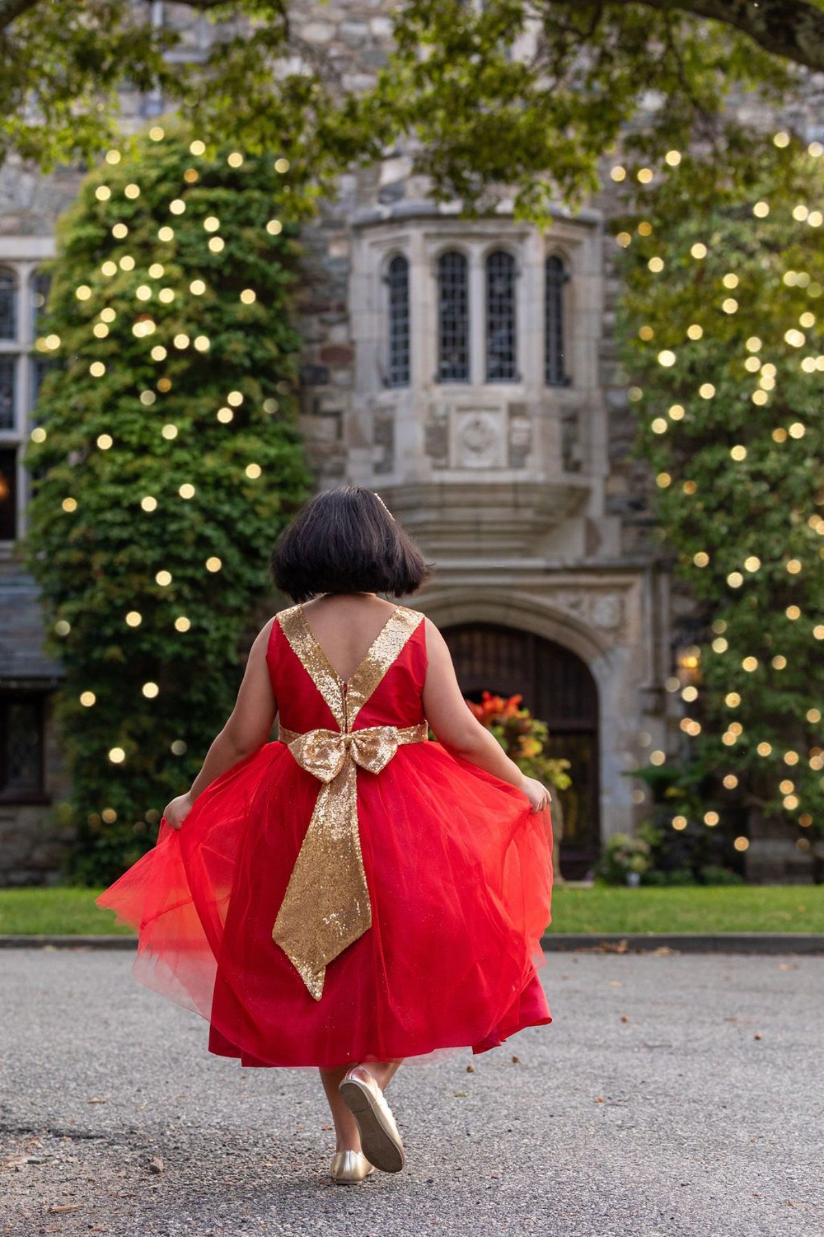 Girls red shop and gold dress